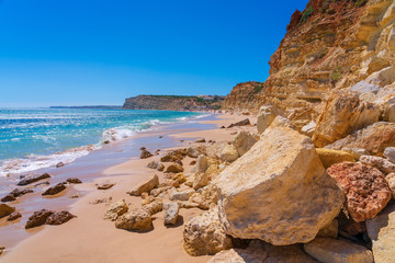 Fototapeta na wymiar Rocks along the beach in Algarve