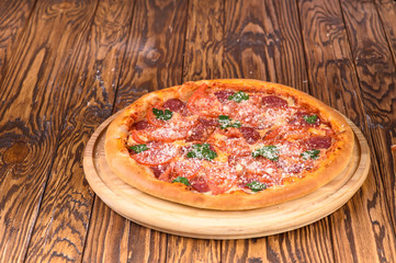  delicious pizza on a wooden table for a menu