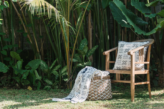 Wooden Traditional Chair And Decor Against Green Background