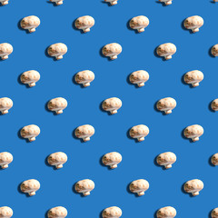 seamless pattern of mushrooms with shadow on blue  background