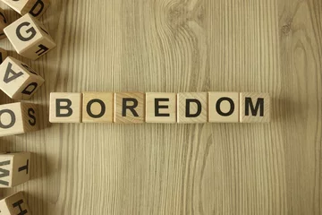 Fotobehang Word boredom from wooden blocks © piter2121
