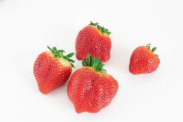 bay leaf and allspice in a metal pan with pieces of chicken and vegetables to boil the broth