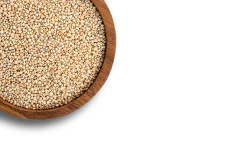 Raw quinoa seeds in wooden bowl  isolated on white.