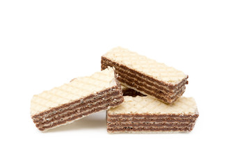 Crispy wafers with creamy hazelnut filling isolated on white background
