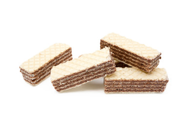 Crispy wafers with creamy hazelnut filling isolated on white background