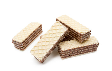 Crispy wafers with creamy hazelnut filling isolated on white background