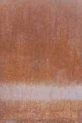 The surface is painted rust. Rusted metal wall. Metal rust background .Grunge rusty metal texture 
