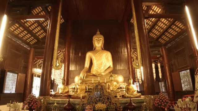 Buddhist Worshipers Praying at Wat Phra Sing Woramahawihan Temple. Thailand