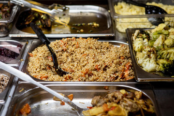 Potato dishes in a fast food restaurant. Fried vegetables