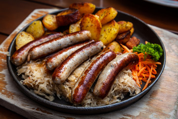 German Sausage with Sauerkraut and Potatoes