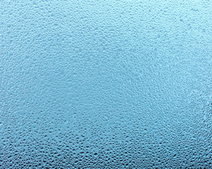 Fototapeta na wymiar Abstract blue cyan water spray glass pattern