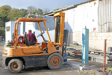 Man working in a Forklift truck	