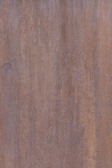 The surface is painted rust. Rusted metal wall. Metal rust background .Grunge rusty metal texture 