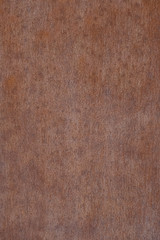 Metal rust background. The surface is painted rust. Rusted metal wall. Grunge rusty metal texture 