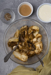 Home made recipe ingredient grilled eggplant in a bowl. Stone background. Top View.