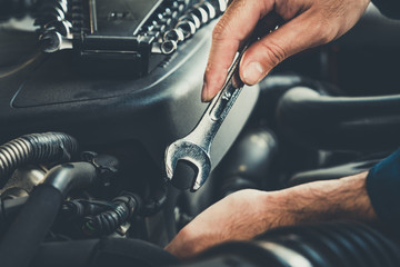 Professional mechanic providing car repair service