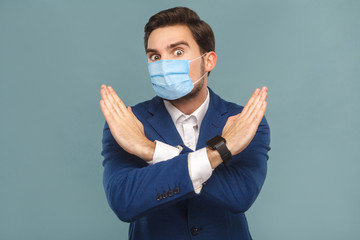 Stop, no! Businessman showing hand ban at camera. Business people concept, richly and success....