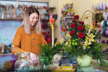   Young  woman working in flower shop
