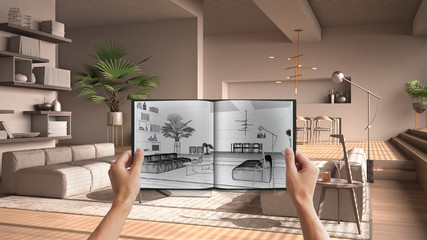 Hands holding notepad with modern living room design blueprint sketch or drawing. Real interior design project background. Before and after concept, architect designer work flow idea