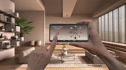 Remote home control system on a digital smart phone tablet. Device with app icons. Interior design...