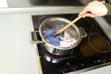 The detail of boiling of home made provisional textile masks to remove all the bacteria and viruses like coronavirus.