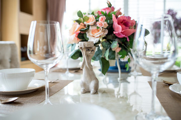 Dishes and the silverware on the dining table 