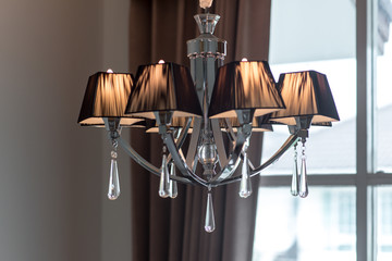 A warm color lamp hanging on the ceiling