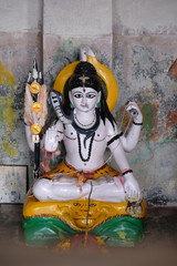 Fototapeta premium Statue of Lord Shiva in Hindu temple in Sambhunagar village, West Bengal, India