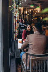 Young loving couple in cafe together. Love, family concept