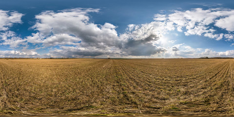 Fototapeta na wymiar full seamless spherical hdri panorama 360 degrees angle view on among fields in spring day with awesome clouds in equirectangular projection, ready for VR AR virtual reality content