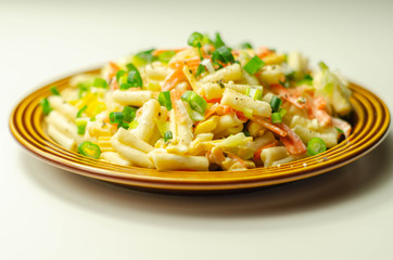 Cavatelli pasta with  iceberg lettuce, carrots, sweet corn, cucumber and chive in a sauce mayonnaise
