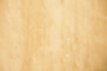 Blurred focus of warm light brown wooden wall for background and decoration. Cool banner on page and cover