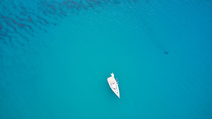 longboarder waiting in blue water