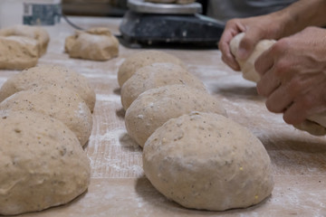 Baker preparing the bread dough