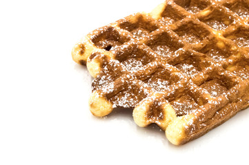 Freshly baked Belgian waffles, close-up. Dessert