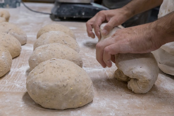 Baker preparing the bread dough