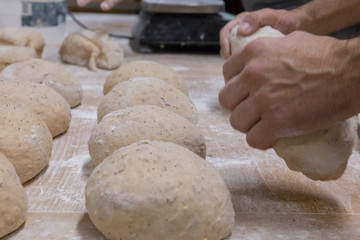 Baker preparing the bread dough