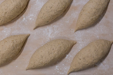 Fototapeta na wymiar Raw bread loafs ready to enter them in the oven