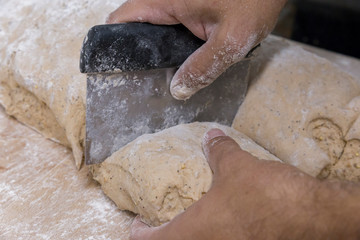 Baker preparing the bread dough