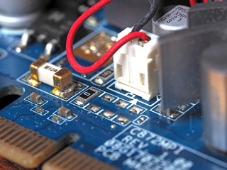 Low-angle close-up of the video card chip showing the Board and capacitors