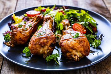 Barbecue chicken drumsticks with roast vegetables