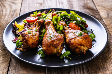 Barbecue chicken drumsticks with roast vegetables