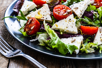 Fresh greek salad - feta cheese, tomato, lettuce, black olives and onion