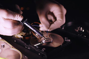 Computer equipment. Repair of PC components. Hard drive for restoration in the workshop. Winchester virus recovery.