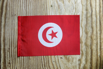 national textile flag on wooden table