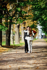 Fototapeta premium True feelings. Couple meeting on a date. Bouquet gift Man giving a bouquet of flowers. Romantic couple.