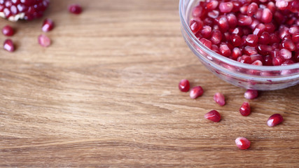 Garnet grains on wooden desk