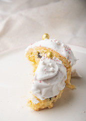 iced icing cup cake with cut topping