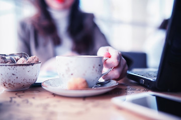 Girl eating coffee cakes