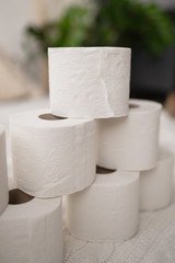stack white recyckled toilet paper white rolls 